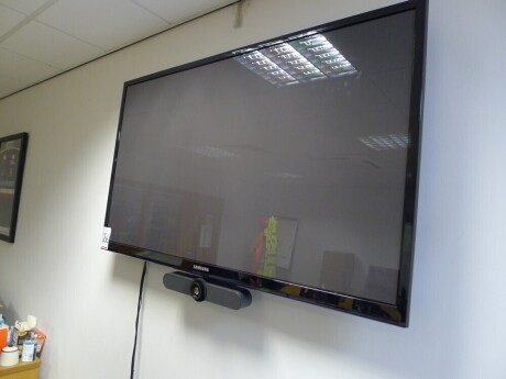 TV and video conferencing system comprising of Samsung 60 inch plasma TV with Logitec conference camera, Logitech Tap touch screen meetings contoller and Polycom Telepresence Trio 8800 conference phone
