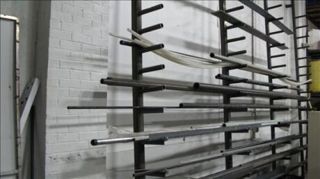 wall mounted pipe rack with pipe on it *** PLEASE NOTE: This lot is offered subject to bulk bid offer on lot 118
